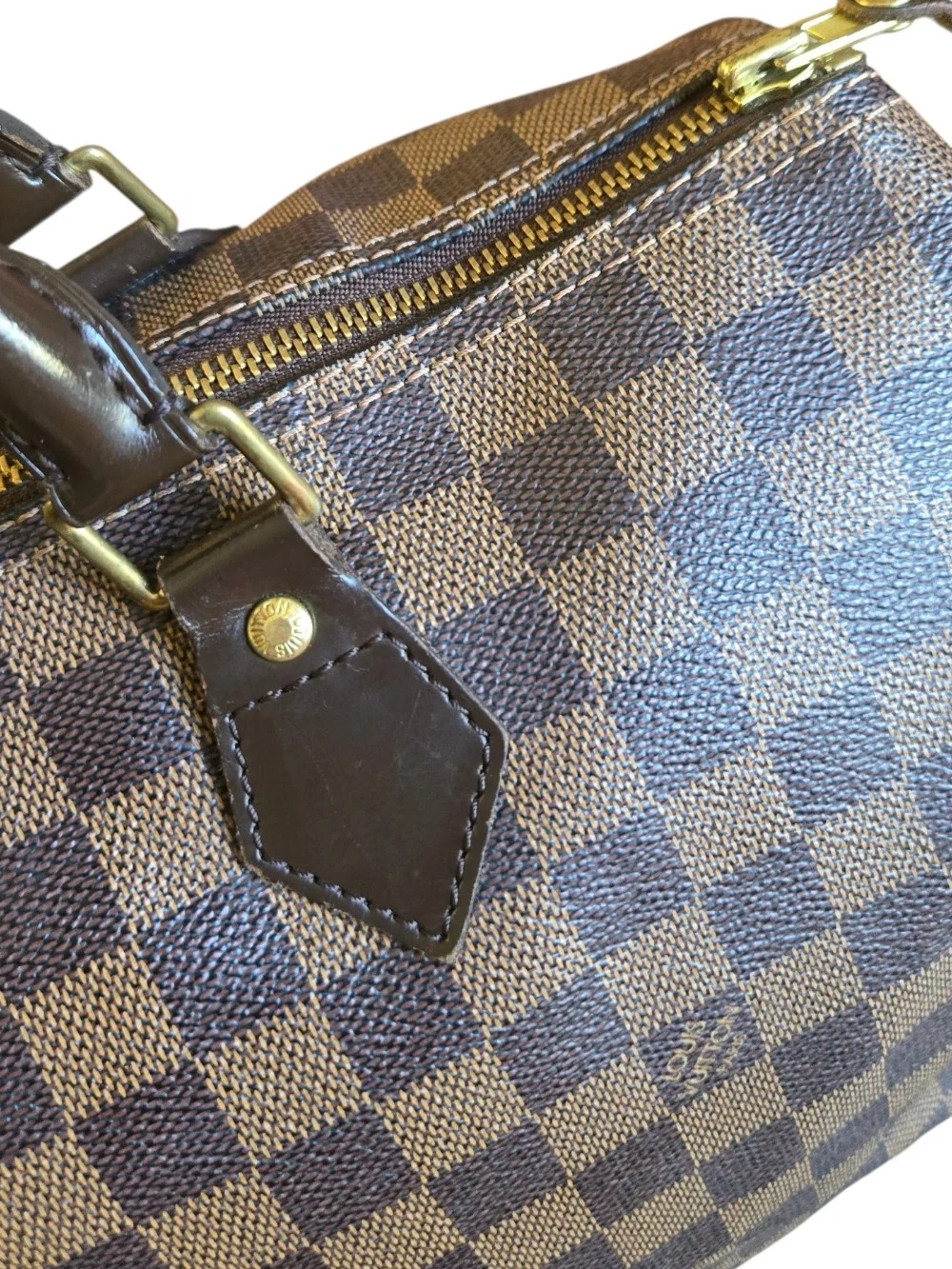 Louis Vuitton Red Canvas Interior with Dark Leather Tab